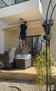 Perfectouch Installing an Awning for a Customer